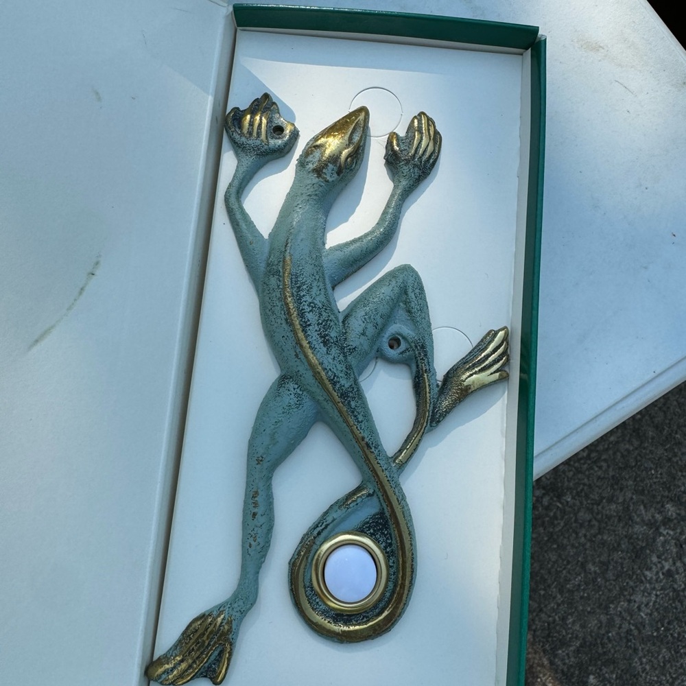 Vintage flora and fauna doorbell solid brass.